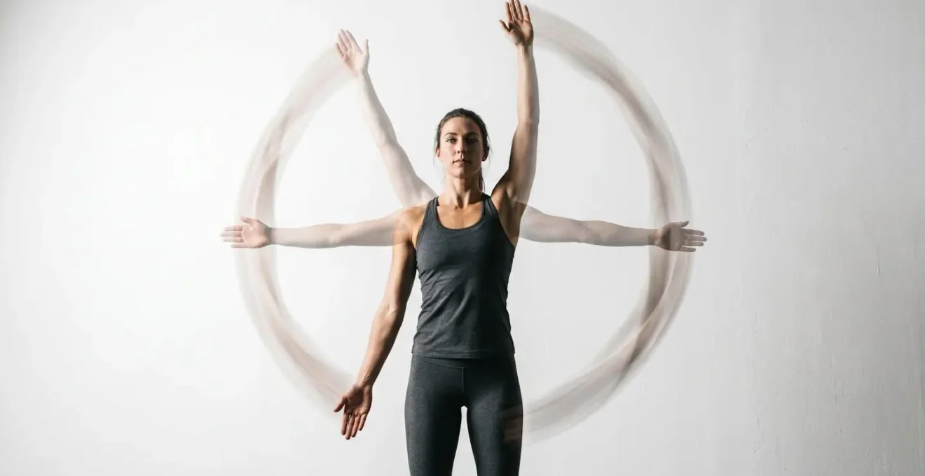 Person performing controlled articular rotation exercise for shoulder joint